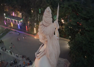 Aerial Night View of Lord Shiva Statue and Devotees in Jabalpur, India