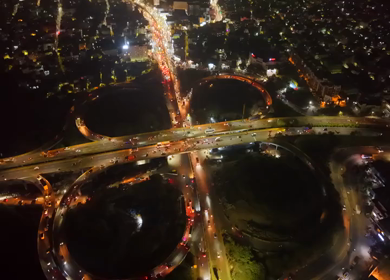Aerial Night View of Maduravoyal Flyover Interchange and City Traffic Chennai Tamil Nadu