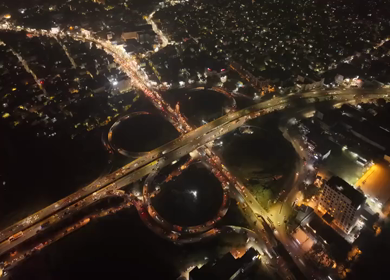 Aerial Night View of Maduravoyal Flyover Interchange and City Traffic Chennai Tamil Nadu