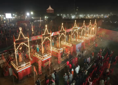 Aerial Night View of Mahakumbh Mela Fairground and Illuminated Ritual Stages Prayagraj Uttar Pradesh