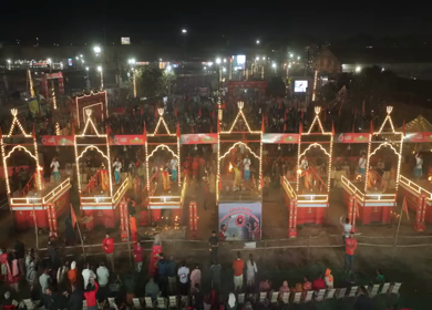 Aerial Night View of Mahakumbh Mela Fairground and Illuminated Ritual Stages Prayagraj Uttar Pradesh