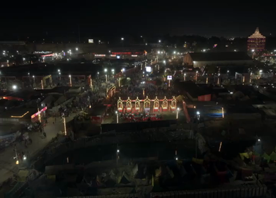 Aerial Night View of Mahakumbh Mela Fairground and Illuminated Ritual Stages Prayagraj Uttar Pradesh