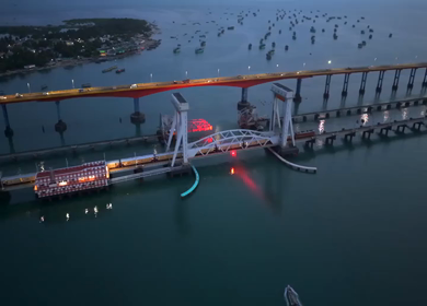 Aerial Night View of Train Crossing Pamban Bridge in Rameswaram Tamil Nadu India