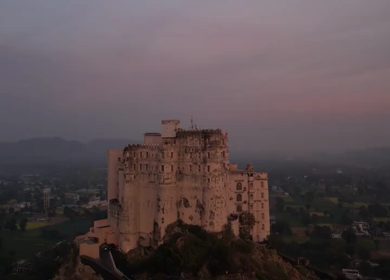 Aerial Night view of Alila Fort Bishangarh, a restored heritage palace hotel in Rajasthan, India