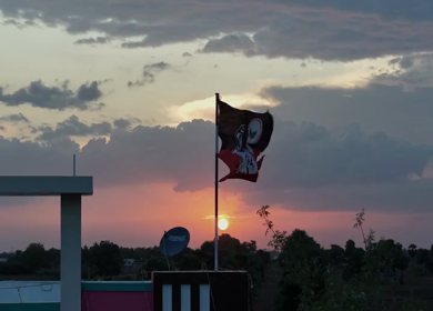 20th April 2026 : Aerial Shot of AIADMK Party Flag During Sunset in Rural Tamil Nadu India