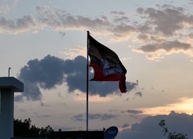 20th April 2026 : Aerial Shot of AIADMK Party Flag During Sunset in Rural Tamil Nadu India