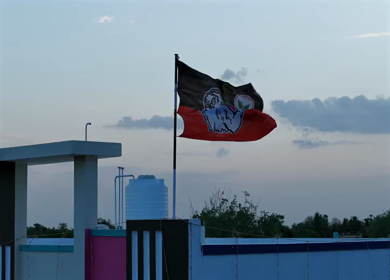 20th April 2026 : Aerial Shot of AIADMK Party Flag During Sunset in Rural Tamil Nadu India