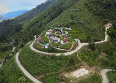 Aerial Shot of Anini Village on Green Hills Dibang Valley Arunachal Pradesh India