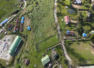 Aerial Shot of Anini Village on Green Hills Dibang Valley Arunachal Pradesh India
