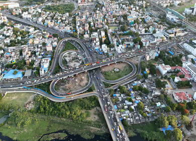 Aerial Shot of Anna Nagar Flyover and Urban Traffic in Chennai Tamil Nadu India