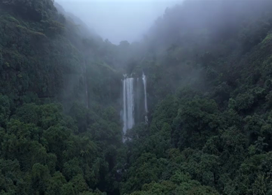Aerial View of Barki Waterfall Amid Lush Green Forest Kolhapur Maharashtra