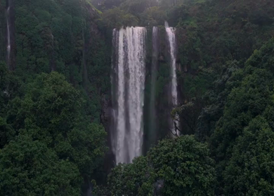 Aerial View of Barki Waterfall Amid Lush Green Forest Kolhapur Maharashtra