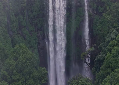 Aerial View of Barki Waterfall Amid Lush Green Forest Kolhapur Maharashtra