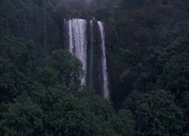 Aerial View of Barki Waterfall Amid Lush Green Forest Kolhapur Maharashtra