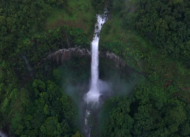 Aerial View of Barki Waterfall Amid Lush Green Forest Kolhapur Maharashtra