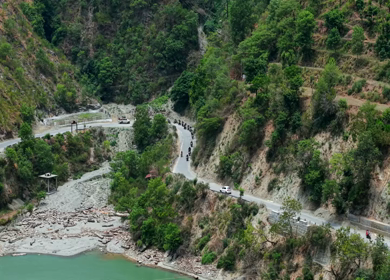Aerial View of Bikers Riding Along Chamera Lake Road, Himachal Pradesh, India