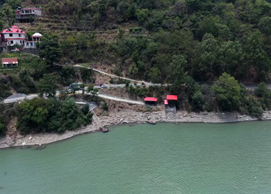 Aerial View of Bikers Riding Along Chamera Lake Road, Himachal Pradesh, India
