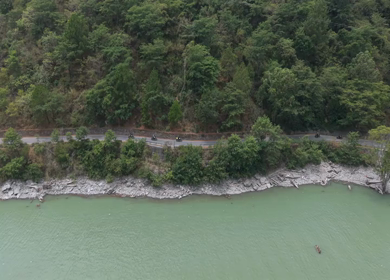 Aerial View of Bikers Riding Along Chamera Lake Road, Himachal Pradesh, India