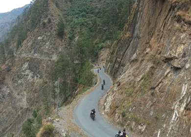 Aerial View of Bikers Riding Along Chamera Lake Road, Himachal Pradesh, India