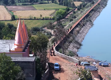 Aerial View of Bikers Riding Along Kolar Dam Reservoir Madhya Pradesh