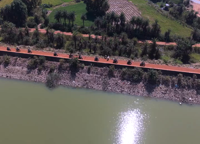 Aerial View of Bikers Riding Along Kolar Dam Reservoir Madhya Pradesh