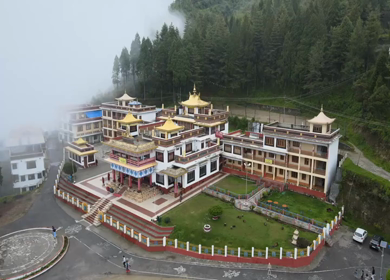 Aerial View of Bomdila Monastery in Misty Himalayan Landscape Arunachal Pradesh India