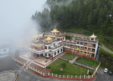 Aerial View of Bomdila Monastery in Misty Himalayan Landscape Arunachal Pradesh India