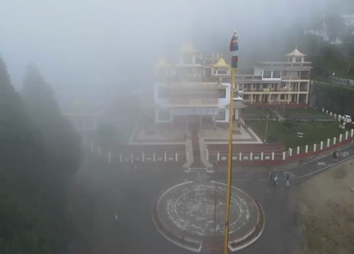 Aerial View of Bomdila Monastery in Misty Himalayan Landscape Arunachal Pradesh India