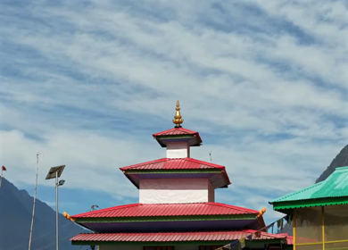 Aerial View of Buddhist Temple Roof with Mountain Landscape in Kaho Arunachal Pradesh India