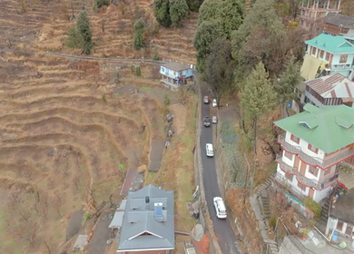Aerial View of Mountain Village and Car Convoy in Kinnaur Himachal Pradesh