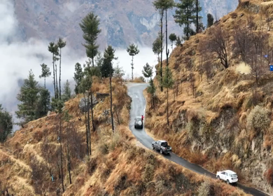 Aerial View of Mountain Village and Car Convoy in Kinnaur Himachal Pradesh