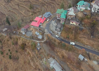 Aerial View of Mountain Village and Car Convoy in Kinnaur Himachal Pradesh