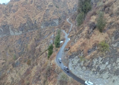Aerial View of Mountain Village and Car Convoy in Kinnaur Himachal Pradesh