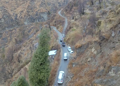 Aerial View of Mountain Village and Car Convoy in Kinnaur Himachal Pradesh
