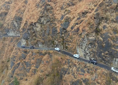 Aerial View of Mountain Village and Car Convoy in Kinnaur Himachal Pradesh