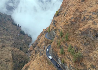 Aerial View of Mountain Village and Car Convoy in Kinnaur Himachal Pradesh