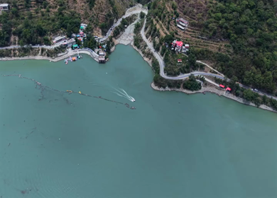 Aerial View of Chamera Dam Reservoir with Speedboats, Himachal Pradesh, India