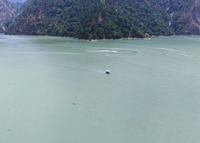 Aerial View of Chamera Dam Reservoir with Speedboats, Himachal Pradesh, India