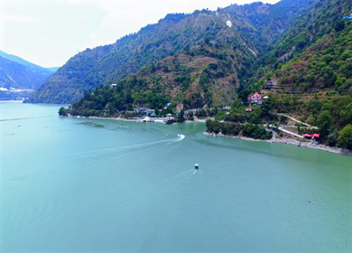 Aerial View of Chamera Dam Reservoir with Speedboats, Himachal Pradesh, India