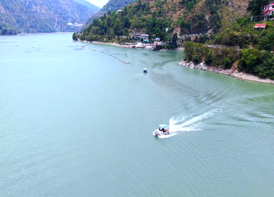 Aerial View of Chamera Dam Reservoir with Speedboats, Himachal Pradesh, India