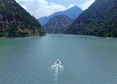 Aerial View of Chamera Dam Reservoir with Speedboats, Himachal Pradesh, India