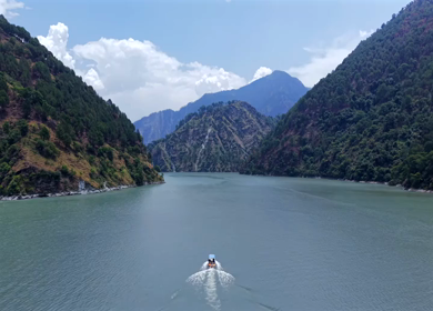 Aerial View of Chamera Dam Reservoir with Speedboats, Himachal Pradesh, India