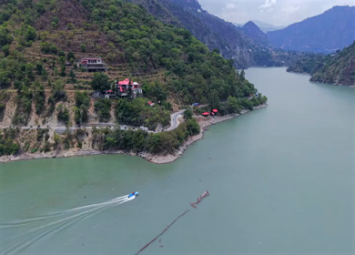 Aerial View of Chamera Dam Reservoir with Speedboats, Himachal Pradesh, India