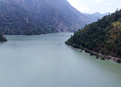Aerial View of Chamera Dam Reservoir with Speedboats, Himachal Pradesh, India