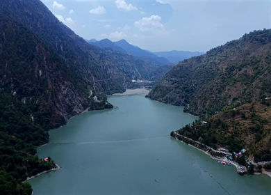 Aerial View of Chamera Dam Reservoir with Speedboats, Himachal Pradesh, India
