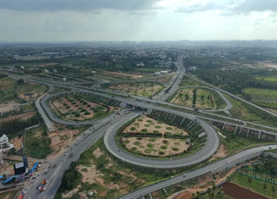 Aerial View of Cloverleaf Flyover and STRR Junction, Hoskote, Bengaluru, Karnataka