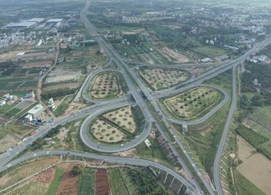 Aerial View of Cloverleaf Flyover and STRR Junction, Hoskote, Bengaluru, Karnataka
