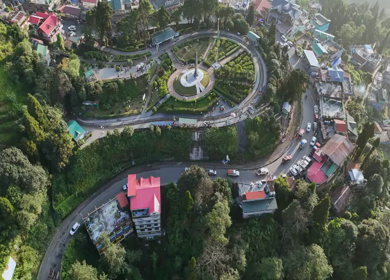 Aerial View of Darjeeling Hill Town with Batasia and Misty Himalayan Landscape