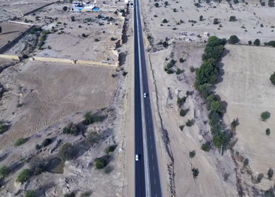 Aerial View of Desert Highway with Wind Turbines in Jaisalmer Rajasthan India