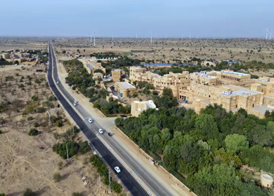 Aerial View of Desert Highway with Wind Turbines in Jaisalmer Rajasthan India